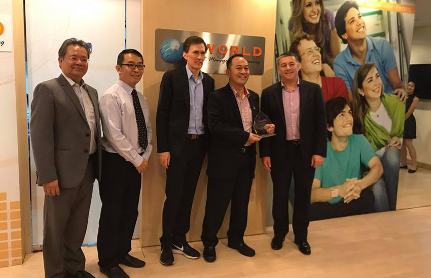 I-WORLD team receiving a CompTIA award